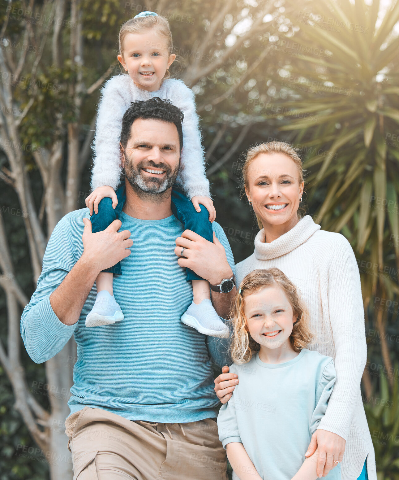 Buy stock photo Happy family, kids and parents piggyback in garden with games, fun and excited for bonding, love and support. Portrait of mother, father and children playing in nature, park and outdoor for adventure