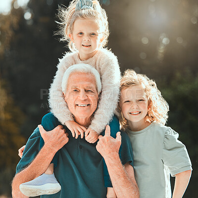 Buy stock photo Shot of a senior man spending time with his grandchildren outside