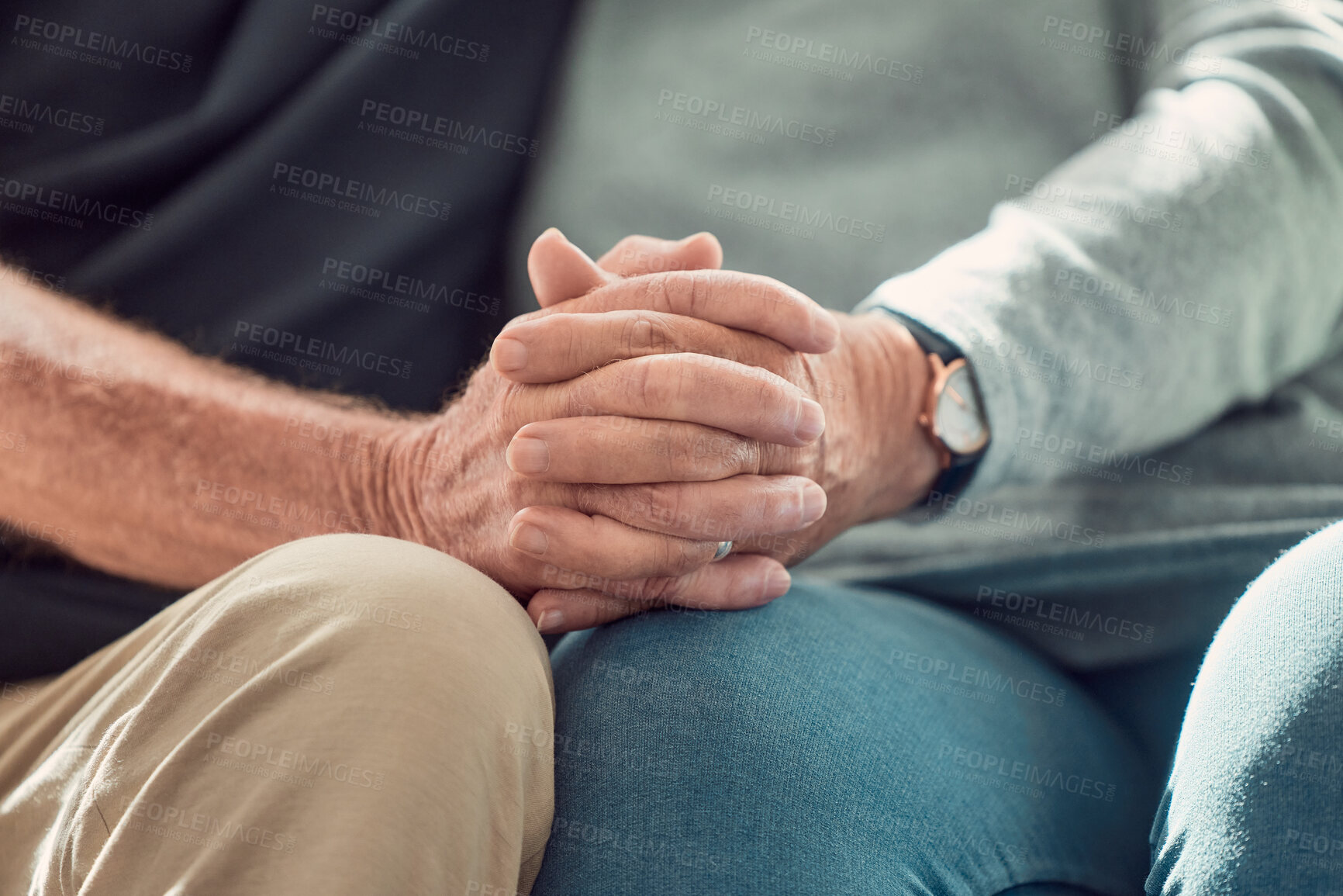 Buy stock photo Senior people, compassion and support with holding hands, assistance or grief in nursing home. Elderly couple, hope and bonding as empathy in living room for love, care or communication in retirement