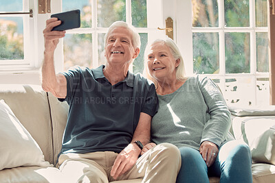 Buy stock photo Selfie, love and elderly couple hug in home, living room and bonding or relax together with support. Retirement, holiday and senior man with mature woman with social media, peace or care in marriage