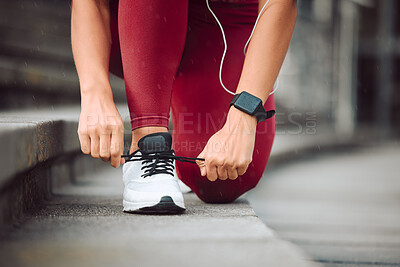 Buy stock photo Running, fitness and person tie shoelace in city for workout, marathon training and exercise. Sports, sneakers and hands of runner with shoes for wellness, health and performance in urban town