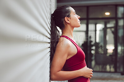 Buy stock photo Break, fitness and thinking with woman in city, outdoor for cardio, training or workout routine. Exercise, rest and running with sports athlete or person in urban town for challenge and competition