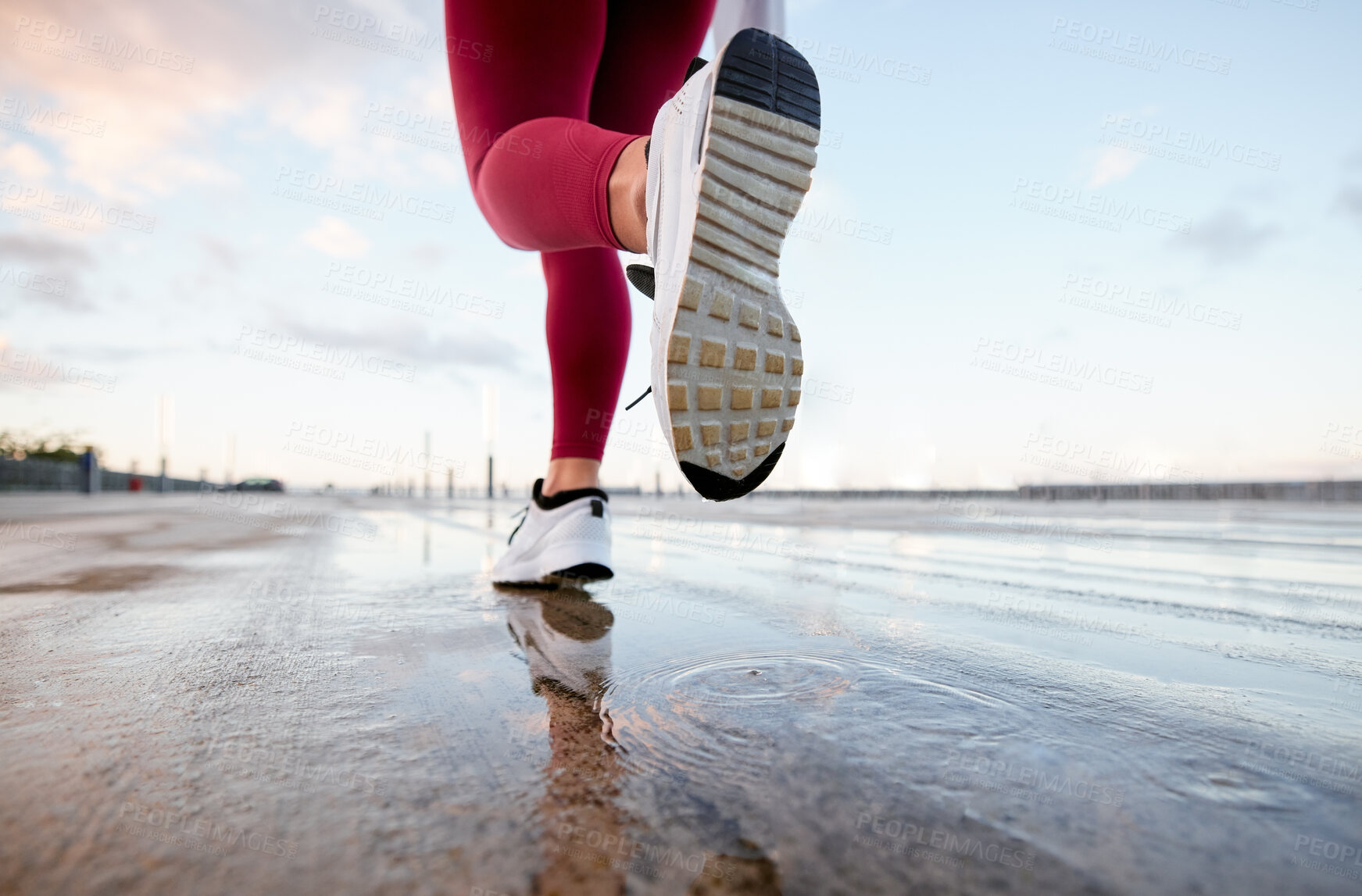 Buy stock photo Shot of an unrecognizable person running in the city