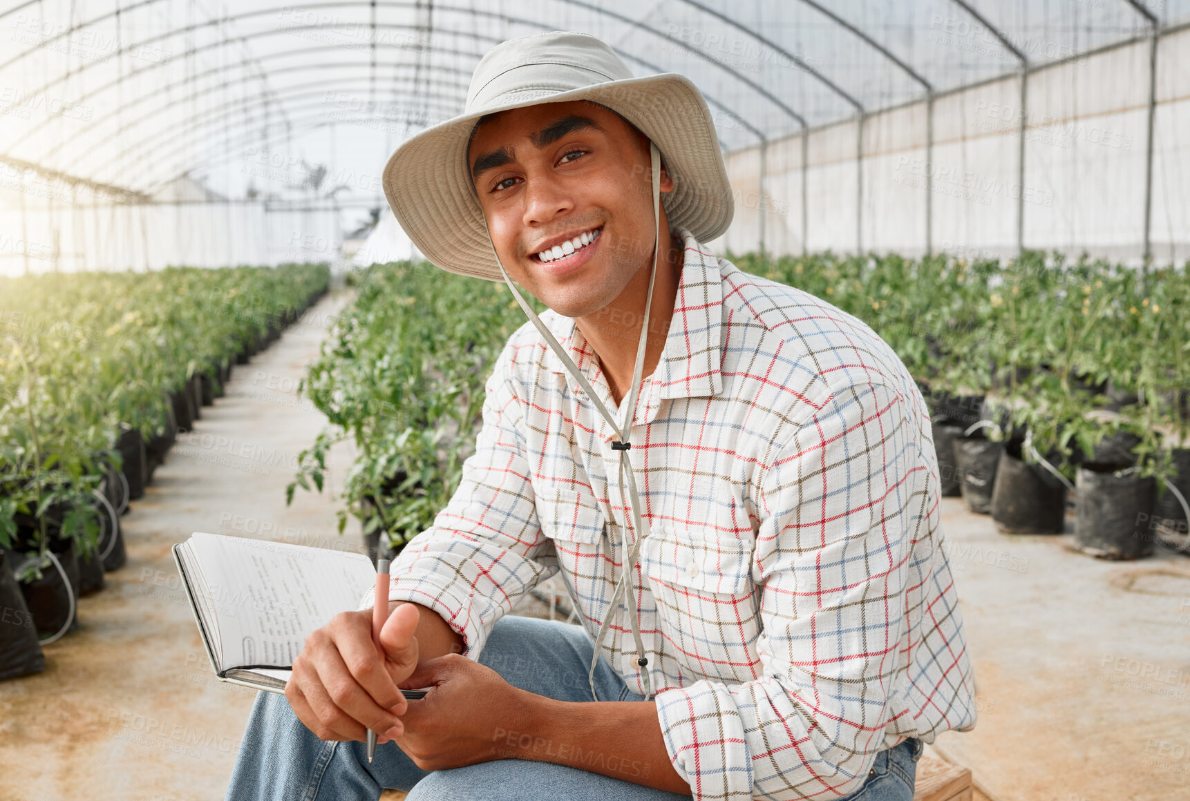 Buy stock photo Man, farmer and portrait with notebook in greenhouse with smile, pride or confidence in countryside. Person, book and happy for agriculture, food production and sustainable small business in Colombia