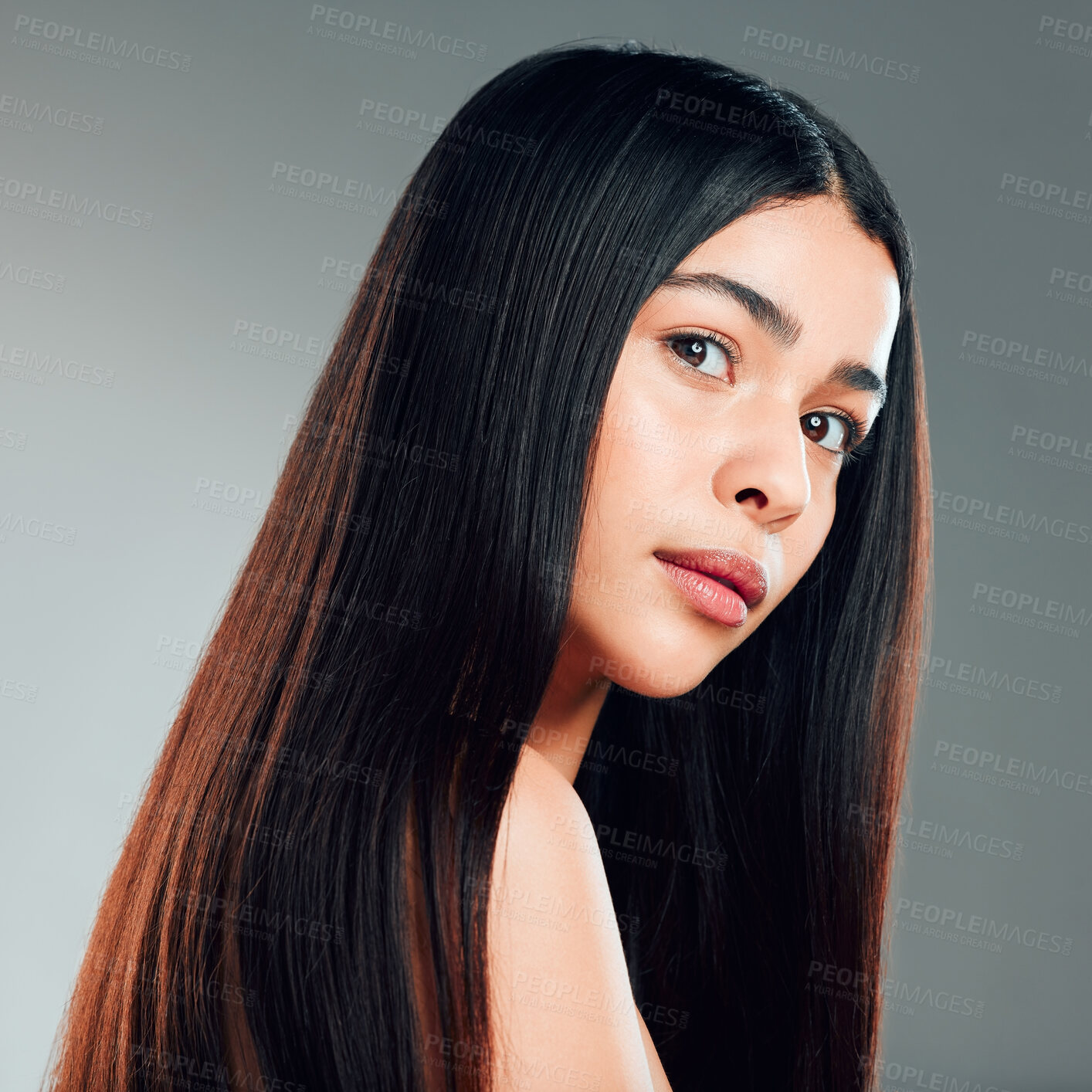 Buy stock photo Woman, serious and hair care in studio with portrait for luxury salon treatment, shampoo or cosmetic. Girl, face and gray background for healthy texture, hairdresser or beauty by Brazilian or keratin