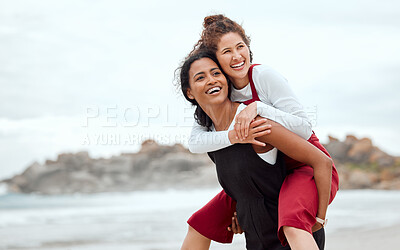 Buy stock photo Shot of a woman giving her friend a piggy back ride