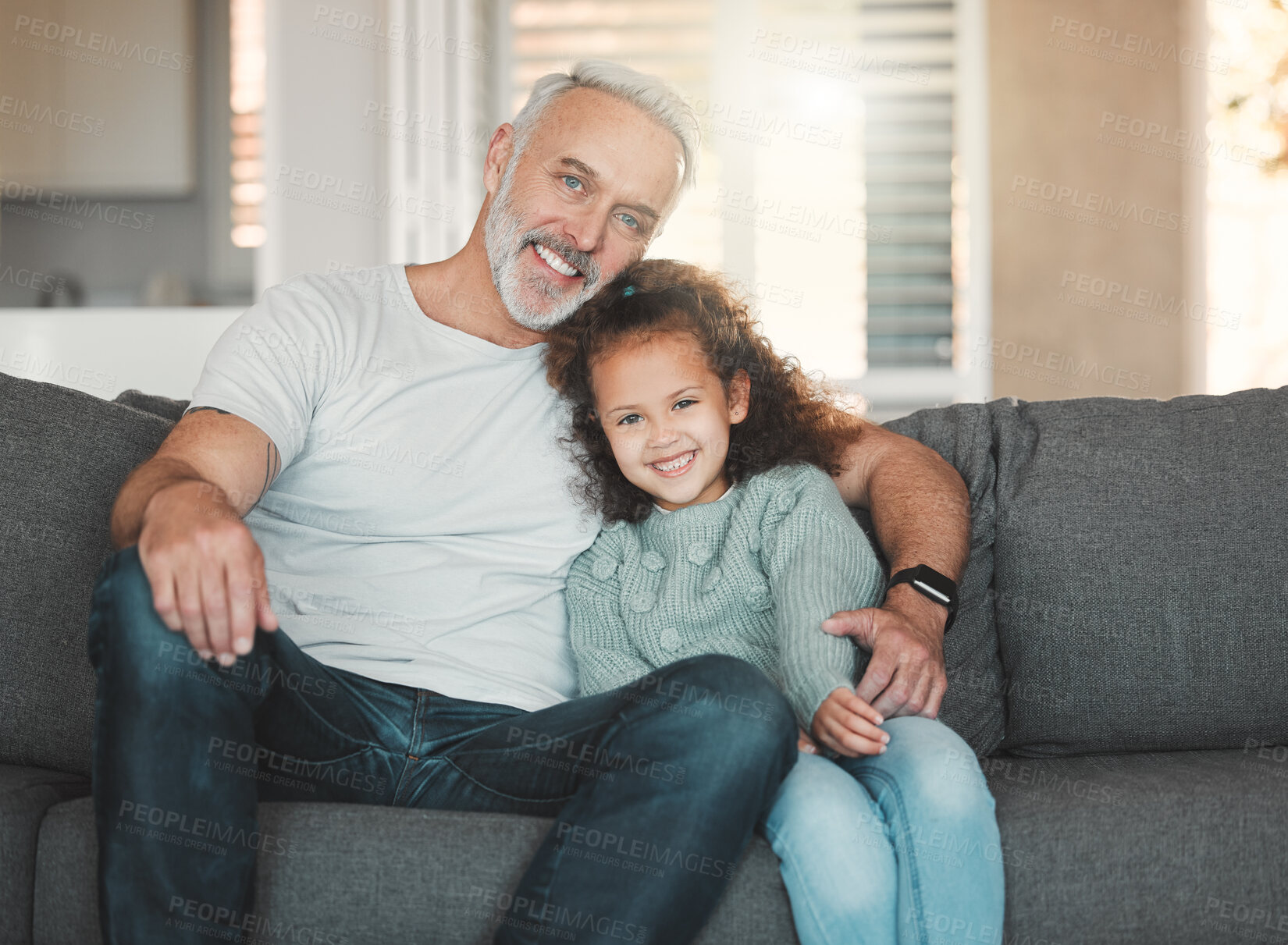 Buy stock photo Grandpa, child and portrait on sofa for love, relax and happy for visit at home. Senior man, young girl and smile in living room with hug, healthy relationship and family with trust for childcare