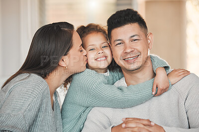 Buy stock photo Hug, kiss and love with family in living room of home together for bonding, support or wellness. Face, happy or relax with daughter, father and mother in apartment for morning or weekend time off