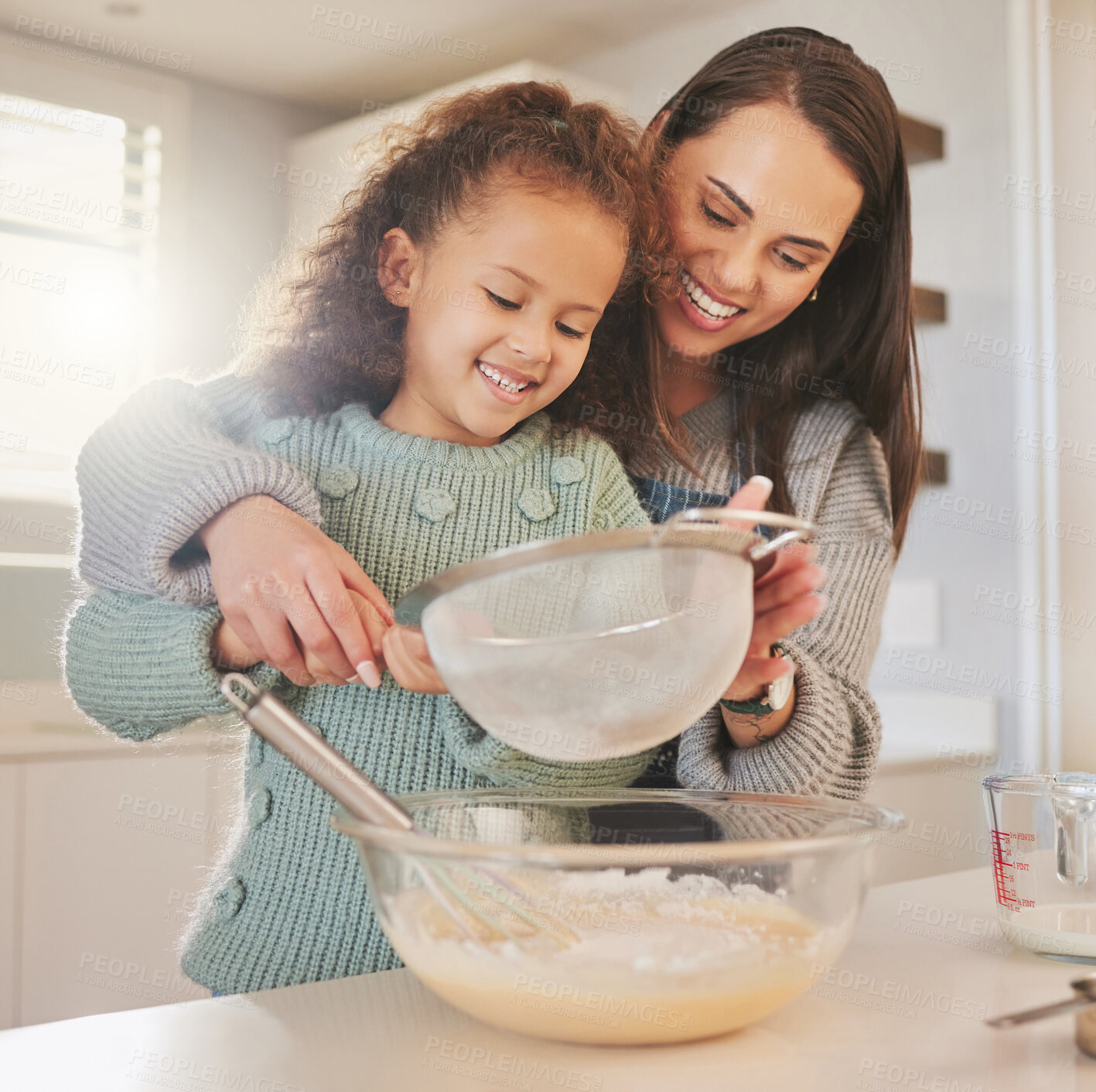 Buy stock photo Happy, mom and girl baking for lesson, dessert and food for learning to prepare ingredients in home. Sifter, smile or mother teaching child cooking skills for help, development or breakfast recipe