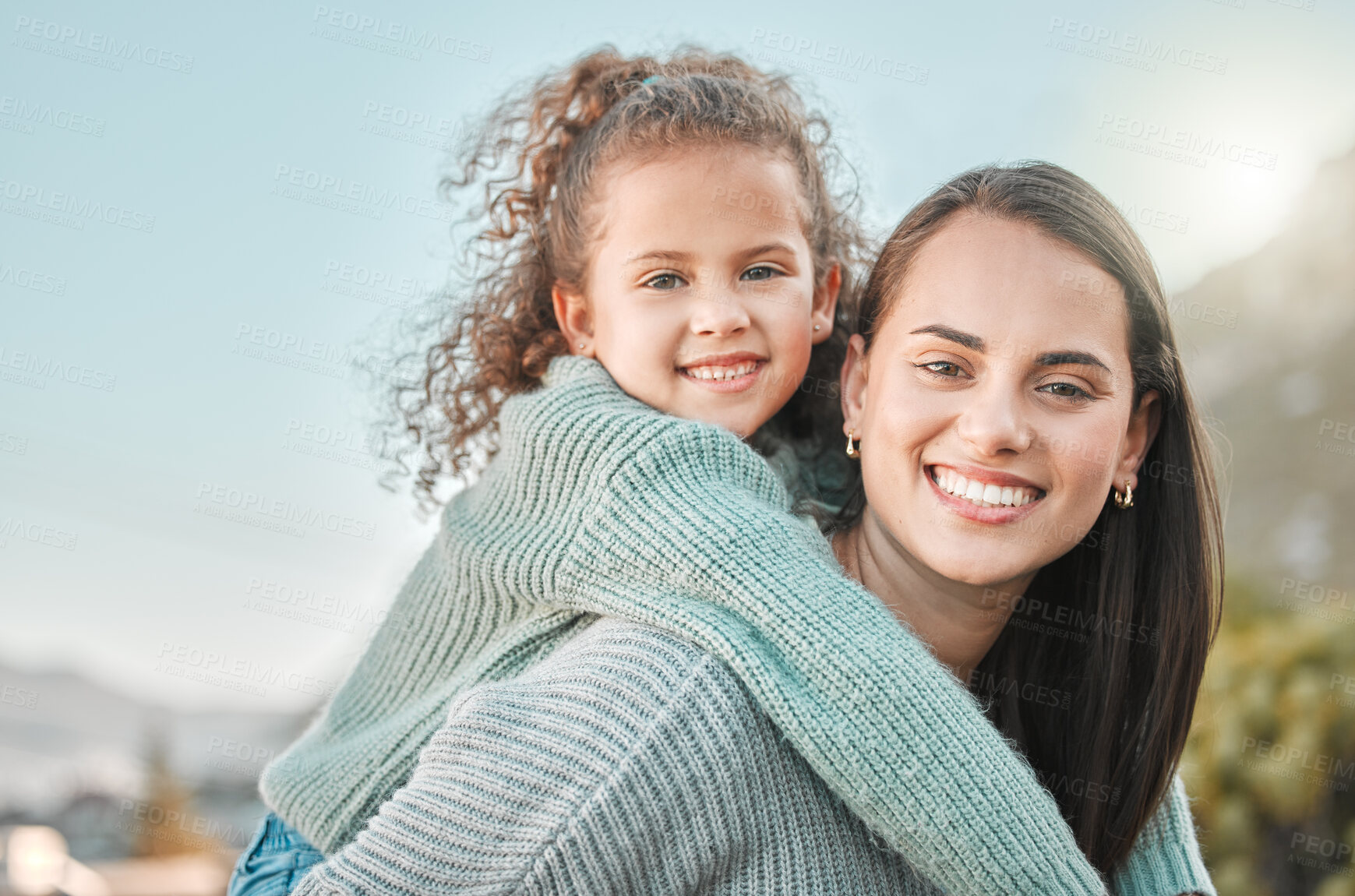 Buy stock photo Mom, girl and happy outdoor with piggyback on portrait for fun, bonding and support in Mexico. People, parent and kid with smile for child development or growth on break to relax, fun and love