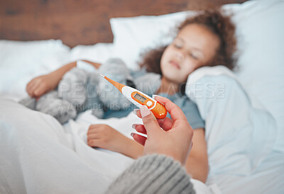 Buy stock photo Shot of an unrecognizable parent taking their sick child's temperature at home