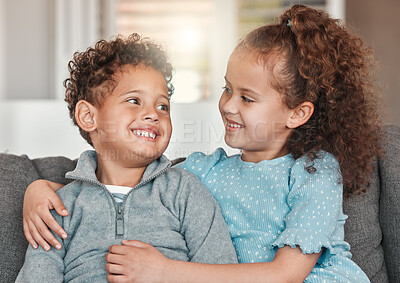 Buy stock photo Shot of two little siblings spending time together at home
