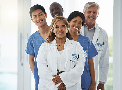 Buy stock photo Portrait, nurses and team of doctors in line, smile and standing together in hospital. Face, healthcare and medical professionals, group diversity or happy surgeons in collaboration for leadership.