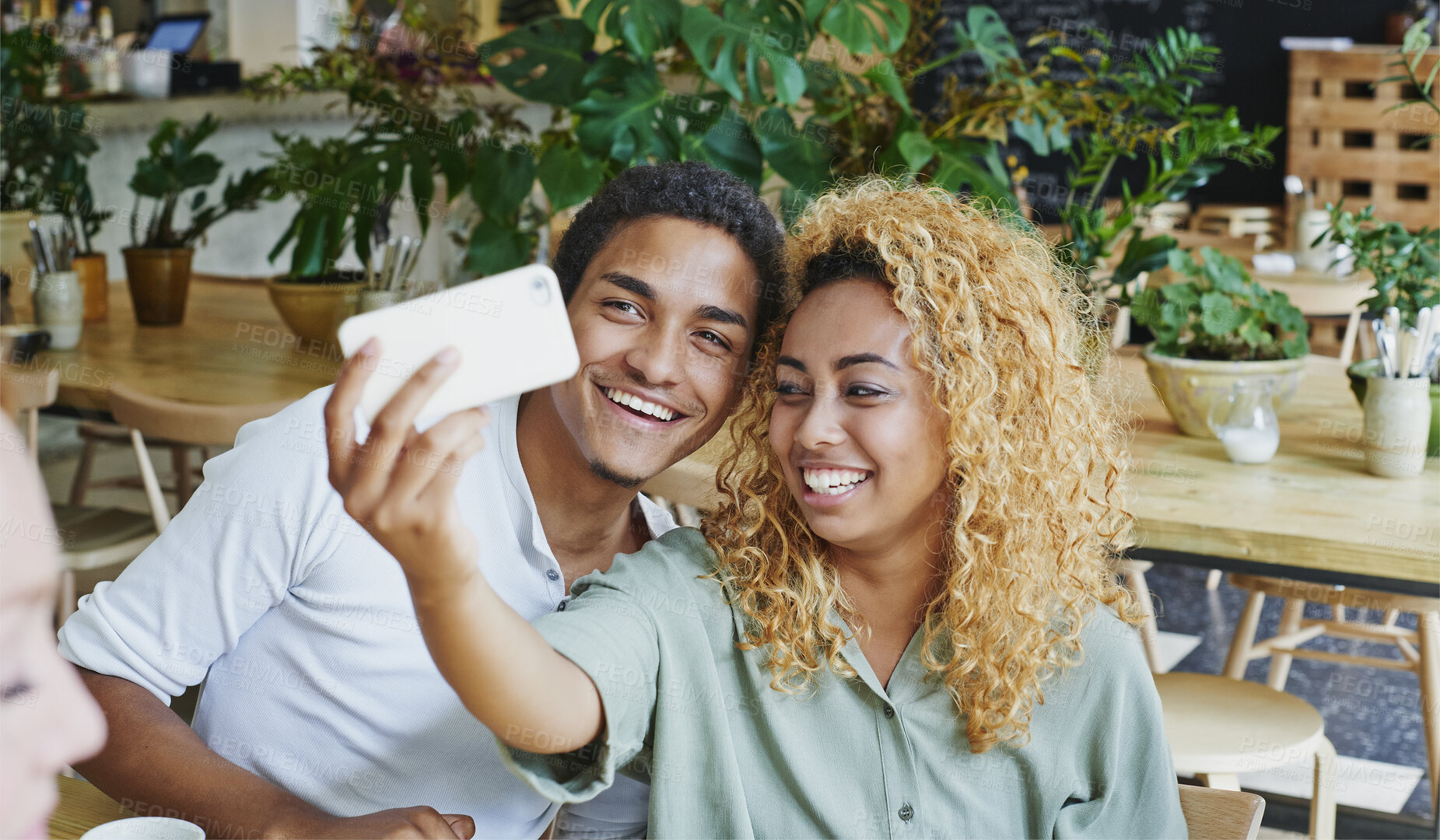 Buy stock photo Black couple, selfie on smartphone and in cafe for love, care and lunch break together. Smile man, laughing woman and happy young people taking photograph in coffee shop, restaurant and social date 