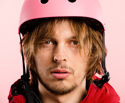 Buy stock photo Cycling, helmet and portrait of man in studio isolated on pink background closeup for sports activity. Face, moody and safety with cyclist person on color for start of health, exercise or fitness