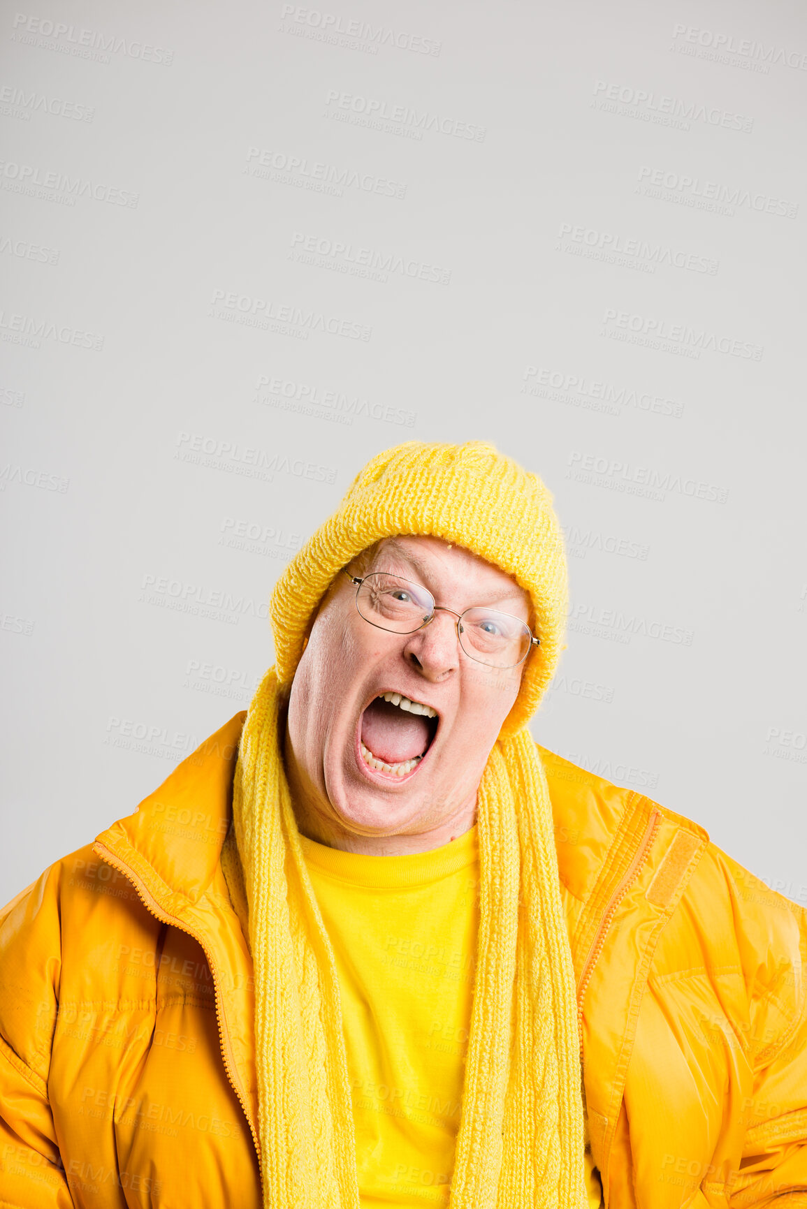 Buy stock photo Shouting, screaming and portrait of man on gray background with anger, upset and crazy reaction. Body language, fashion announcement and isolated person with loud noise, voice and comic in studio