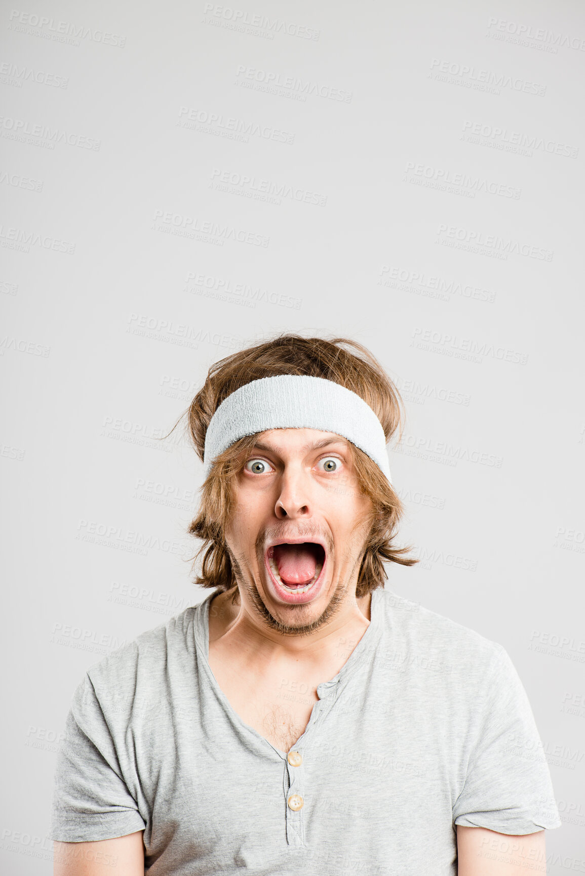 Buy stock photo Man, fear portrait and shouting in studio, mental health and alert for terror on gray background. Male person, screaming and anxiety for information, yelling and horror for announcement or worry