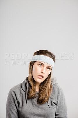 Buy stock photo Woman, lost and annoyed face in studio for rude personality, negative reaction and bored with headband. Female person, ignore and disappointed facial expression on white background for frustrated