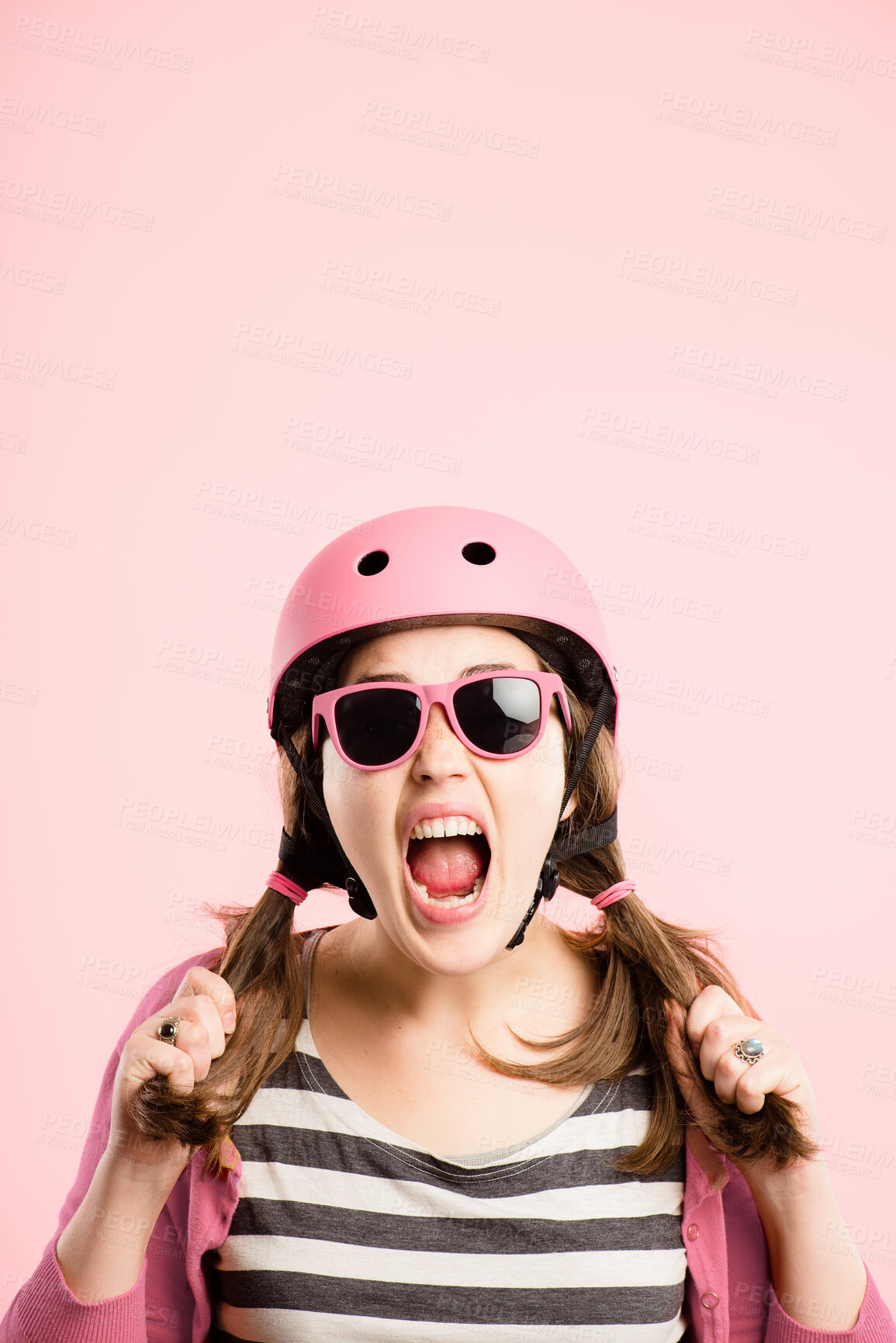 Buy stock photo Bike, helmet and woman in studio with scream, stress and retro fashion sunglasses with mockup space. Shout, anger and frustrated girl with vintage style, cycling gear and tantrum on pink background.