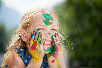 Buy stock photo Girl, child and paint on face outdoor at school for creative learning, art assignment and education fun in nature. Student, kid and happy with colorful mess for craft, artwork and playing at academy