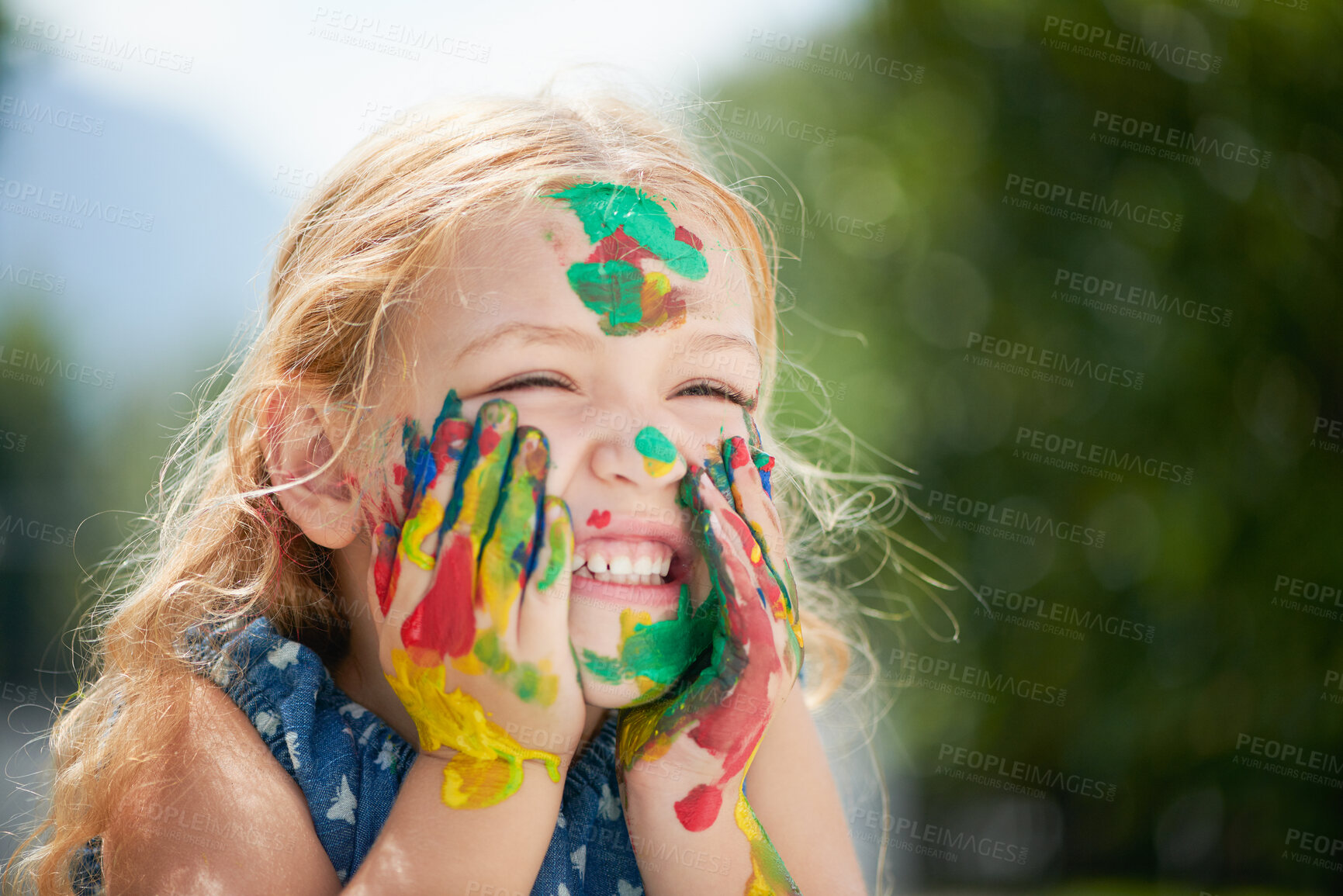 Buy stock photo Girl, child and paint on face outdoor at school for creative learning, art assignment and education fun in nature. Student, kid and happy with colorful mess for craft, artwork and playing at academy