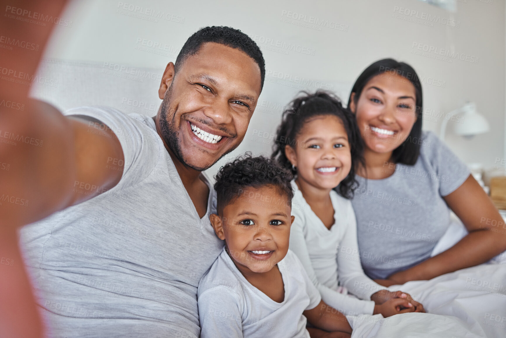 Buy stock photo Family selfie, happy and parents in bed with children for bonding, love and fun at home. Man, woman and kids portrait with girl and boy in bedroom for relax, weekend rest or smile together in morning