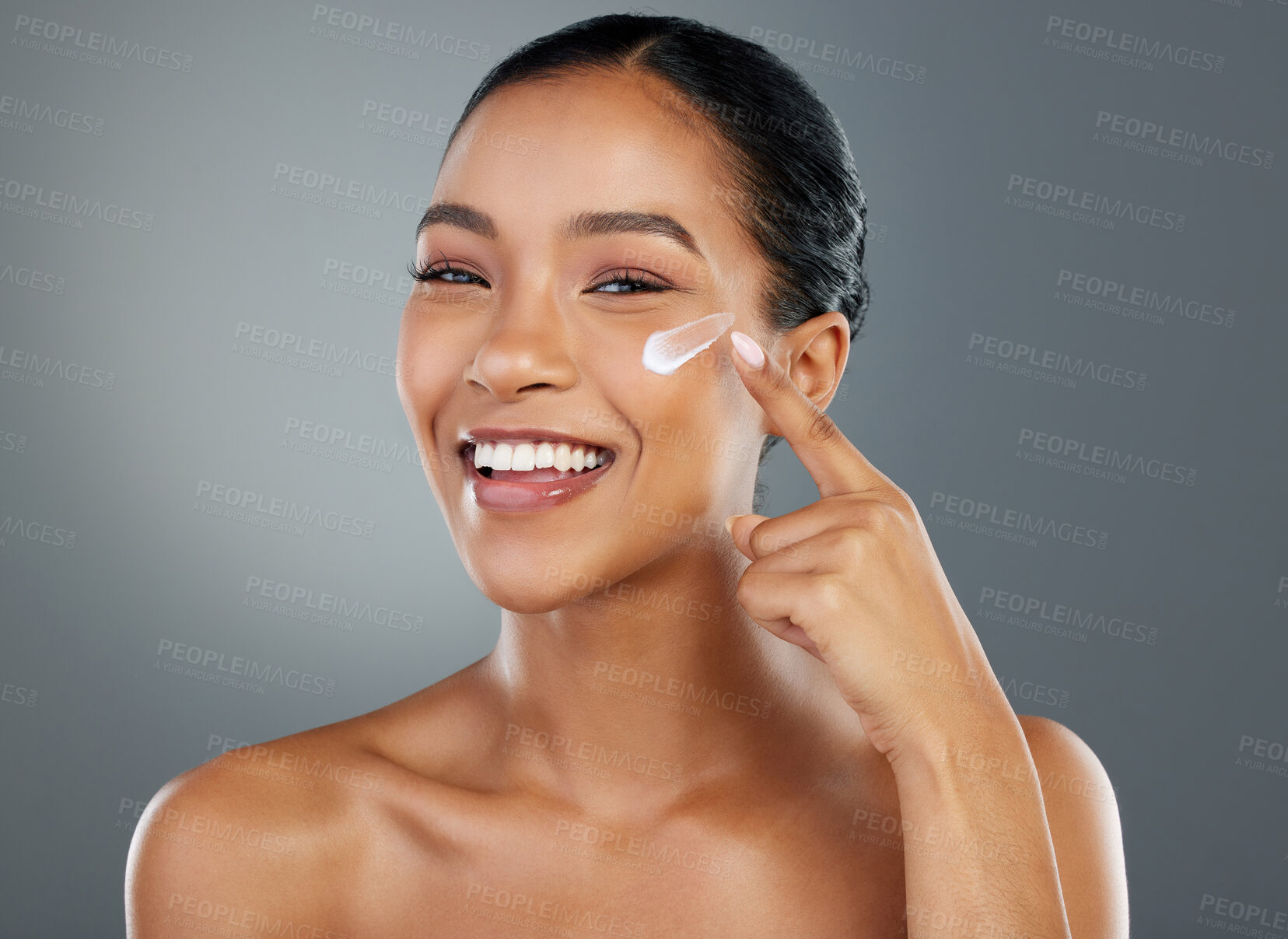 Buy stock photo Woman, portrait and cream with beauty in studio for collagen treatment, skin hydration and skincare. Mockup, happy and cosmetics product with hyaluronic acid, retinol and wellness on gray background