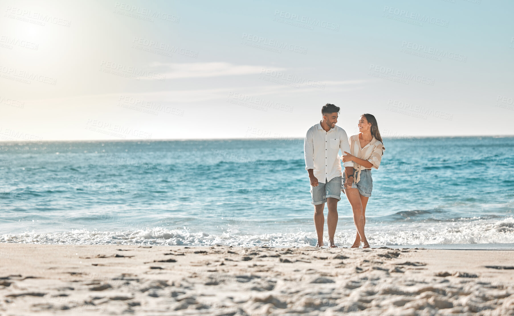 Buy stock photo Space, sky or romantic couple at walking to travel for love on vacation, anniversary or holiday. Mockup, peace and people at beach for bonding together for romantic trip on tropical island in Bali