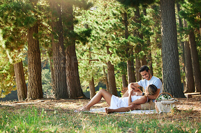 Buy stock photo Couple on picnic, nature park and relax together outdoor, support and comfort with love and care while bonding. Summer, holiday with man and woman cuddle, happiness and relationship with trust