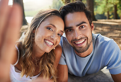 Buy stock photo Selfie, happy and portrait of a couple in nature for a memory, date and bonding. Smile, looking and a young man and woman taking a photo in the woods or forest for relationship memories together