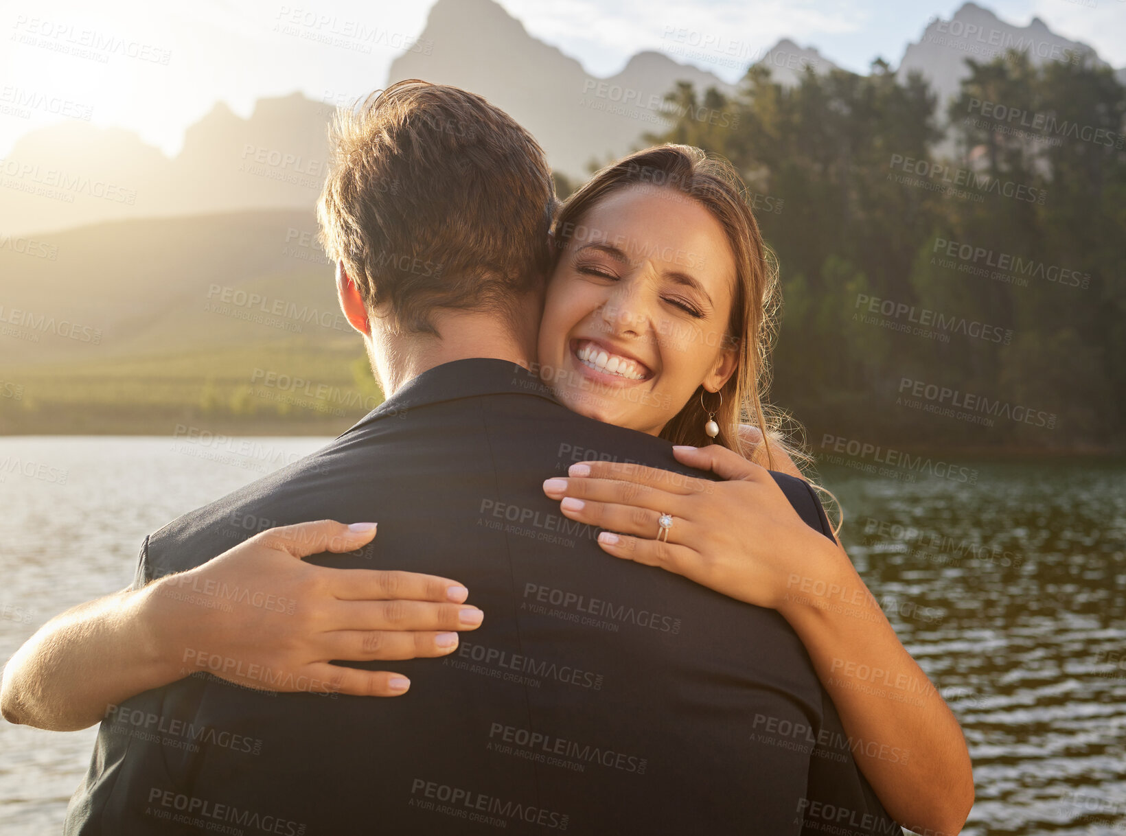 Buy stock photo Wedding, lake and happy couple hugging in nature and water with passion, smile and romance. Marriage, excited bride and groom hug to celebrate romantic relationship, loving man and woman together.