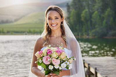 Buy stock photo Cropped portrait of an attractive young bride outside on her wedding day