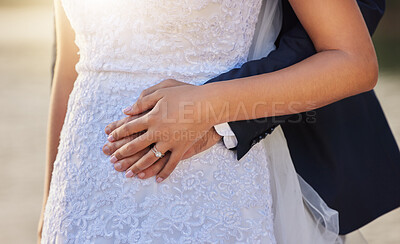 Buy stock photo Cropped shot of an unrecognizable bride and groom on their wedding day