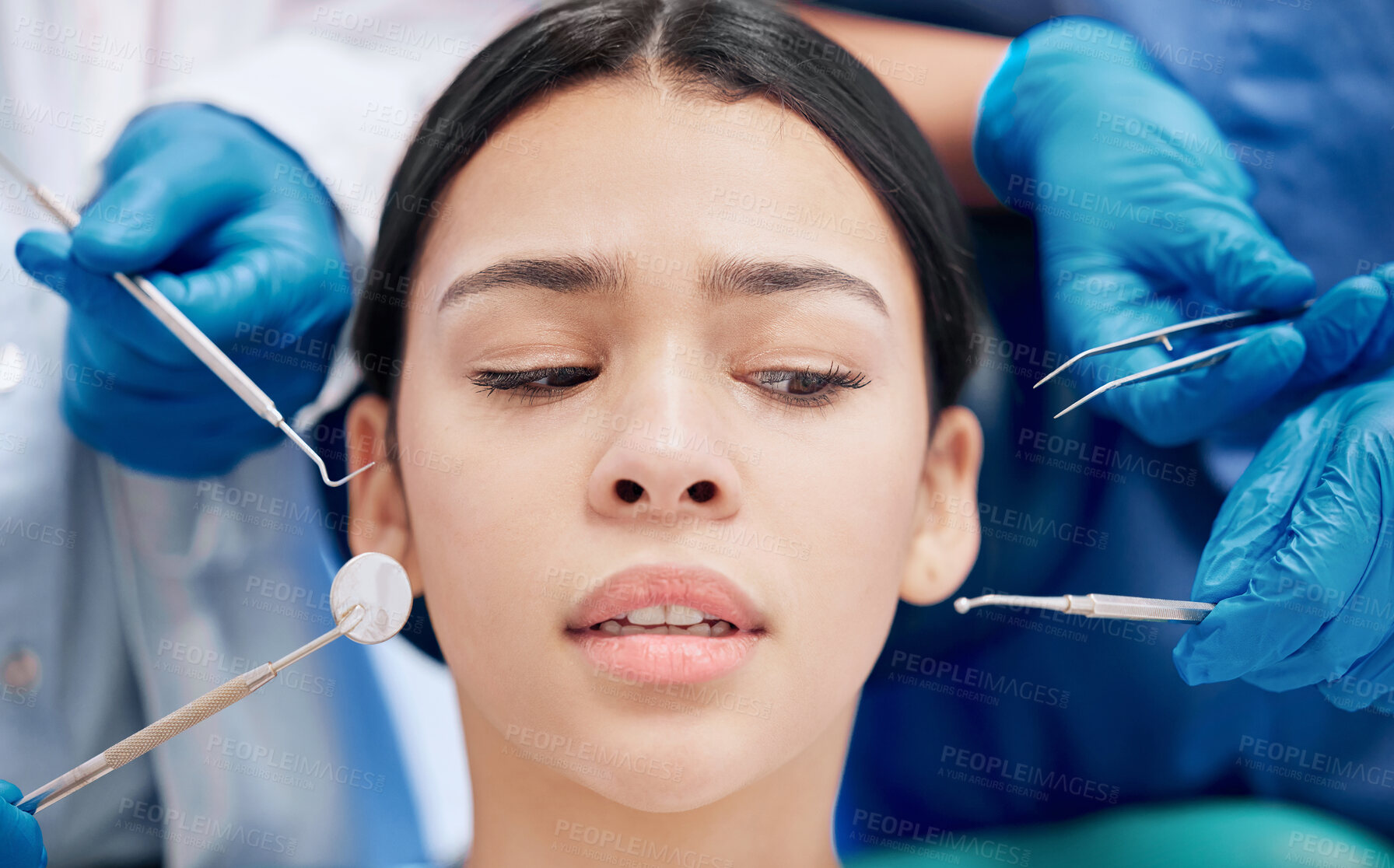 Buy stock photo Patient, scared and dentist with equipment in clinic with oral health, healthcare and dental care for teeth. Girl, fear and orthodontist in hospital for cleaning, veneers and surgery with excavator