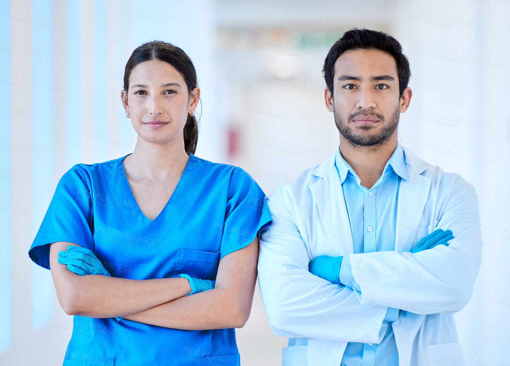 Buy stock photo Team, doctors and portrait with arms crossed for healthcare, collaboration and solidarity for trust in hospital. Man, woman and cardiology employees with confidence and support for medical career