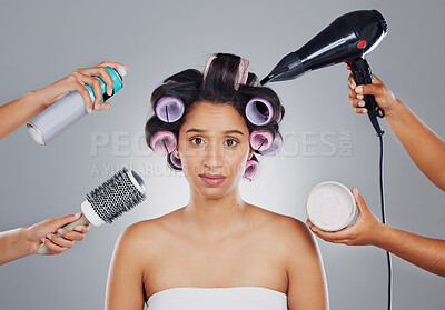 Buy stock photo Cropped portrait of an attractive young woman looking overwhelmed while getting done backstage
