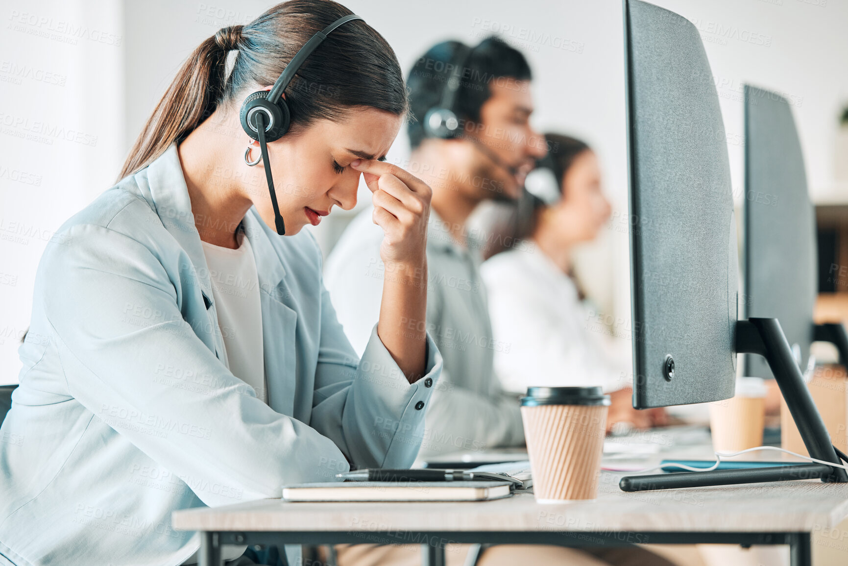 Buy stock photo Call center, computer and depression with woman in telemarketing office for assistance or help. Desk, headset and stress with employee at work for customer service or support as virtual assistant
