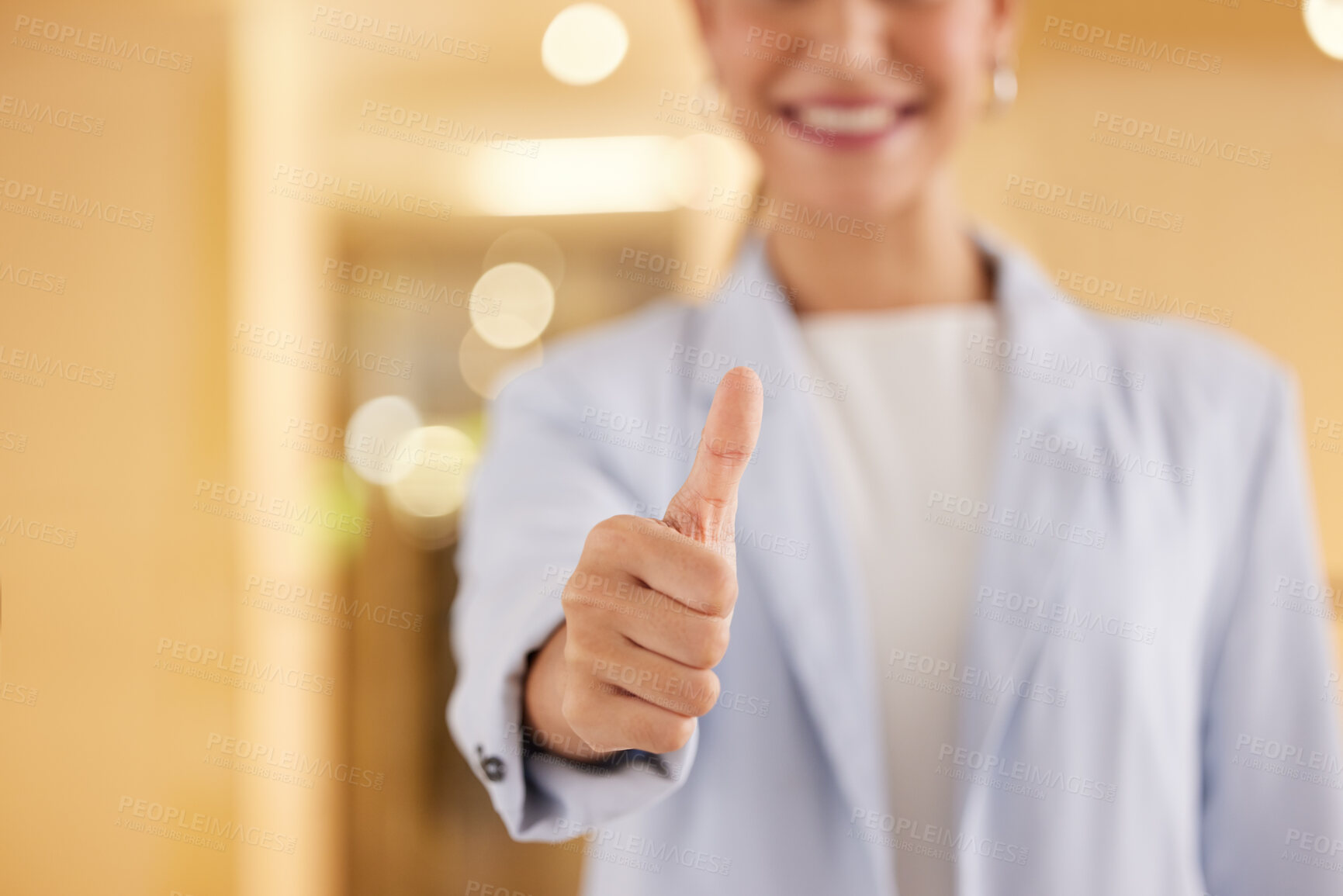 Buy stock photo Closeup shot of an unrecognisable businesswoman showing thumbs up in an offce