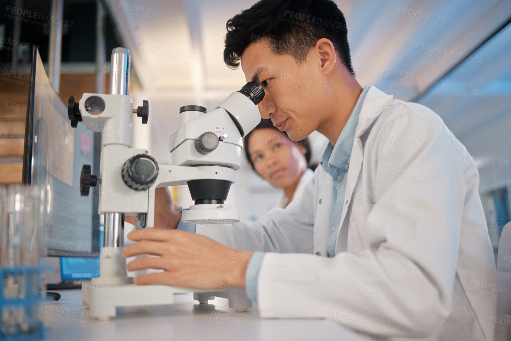 Buy stock photo Employees, scientist and microscope at laboratory for scientific research and investigation. People, medical specialists and experiment in microbiology for virus, germs and bacteria for pandemic