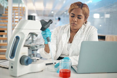 Buy stock photo Shot of a young female lab tech filling a petri dish with samples