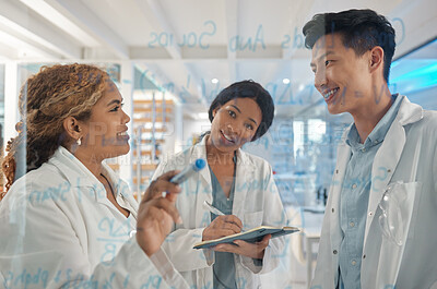 Buy stock photo Shot of a group of lab workers brainstorming ideas