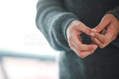 Buy stock photo Hands, anxiety and person in counseling for therapy, trauma or mental health in psychologist office. Woman, fidgeting or PTSD in session for depression, paranoia or memory at consultation for healing