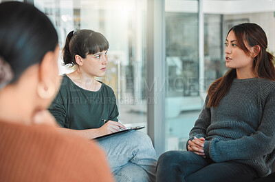 Buy stock photo Shot of a group of people attending a therapy session