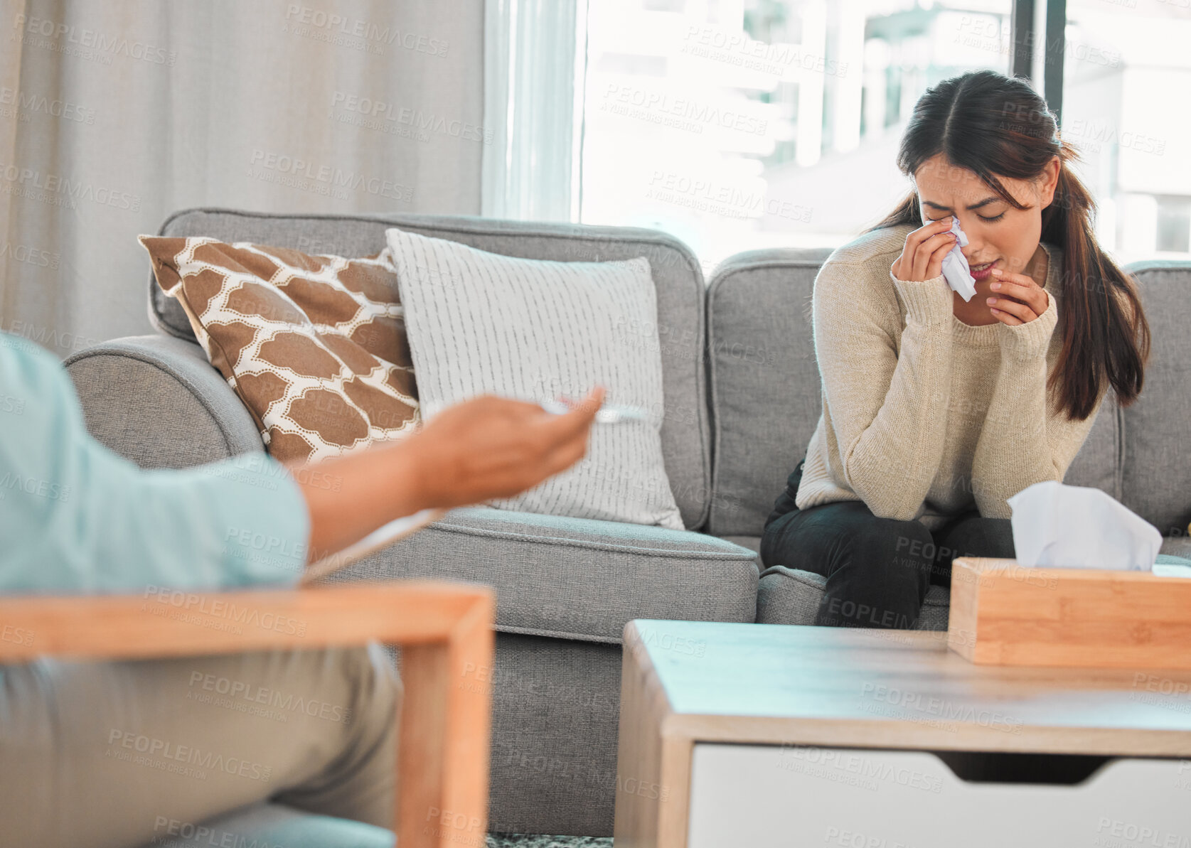 Buy stock photo Crying, therapist and woman on sofa for counseling, professional support or healthcare for stress. Mental health, consultation and psychologist with medical advice for sad patient on couch in office