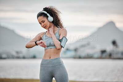 Buy stock photo Time, pulse and woman in nature for exercise, marathon training and workout listening to music, audio and podcast. Sports, fitness and person track heartbeat for wellness, health and running outdoors