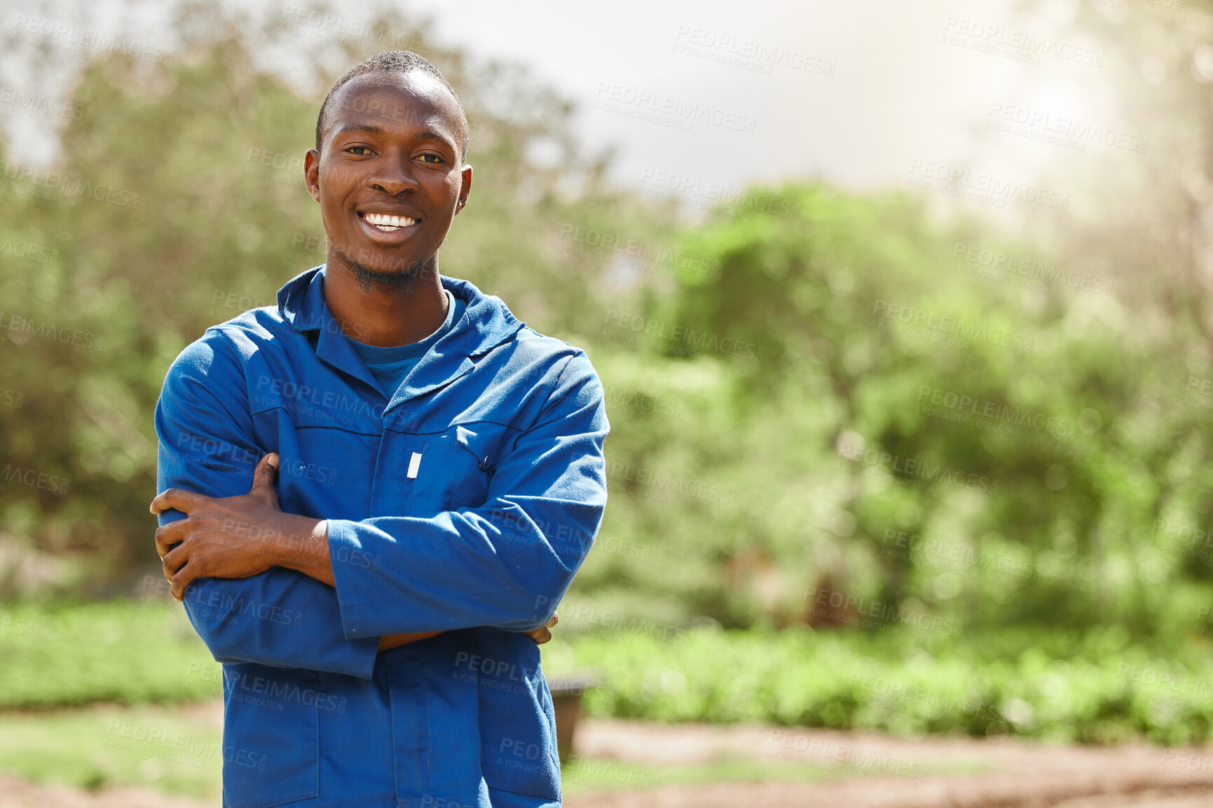 Buy stock photo Portrait, farmer and happy black man with arms crossed in countryside for agriculture, agro business and employee outdoor. Sustainability, confident person and smile with nature, ecology and worker