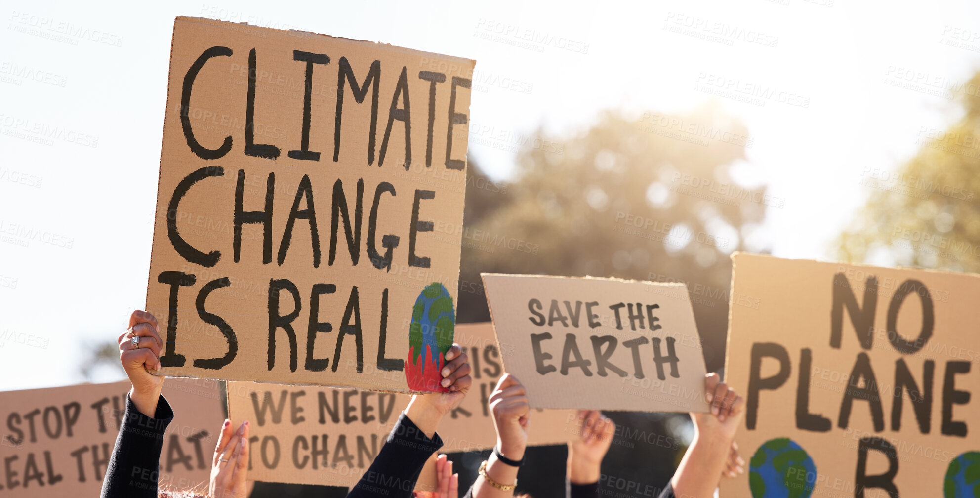 Buy stock photo Protest, climate change and poster with a group of people outdoor at a rally or march for conservation. Global warming, freedom and environment with a crowd walking together during a community strike