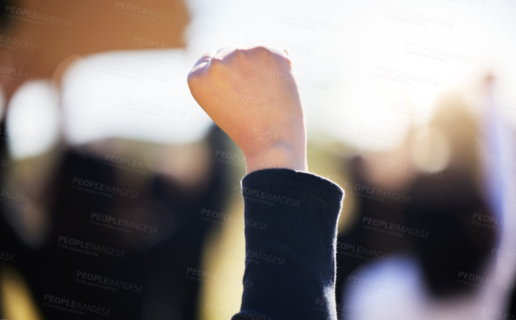 Buy stock photo Protest, environment and fist for climate change, global warming or rally in park. Outdoor, demonstration and hand of person with group for call to action, pollution crisis or protect nature