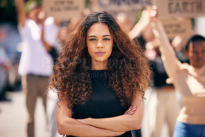 Buy stock photo Woman, arms crossed and protest crowd in street for planet, climate change or sustainable future. Girl, leadership portrait or rally for earth, sustainability or justice for environment in metro road