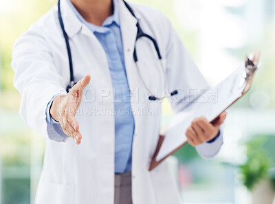 Buy stock photo Closeup shot of an unrecognisable doctor extending a handshake in a hospital